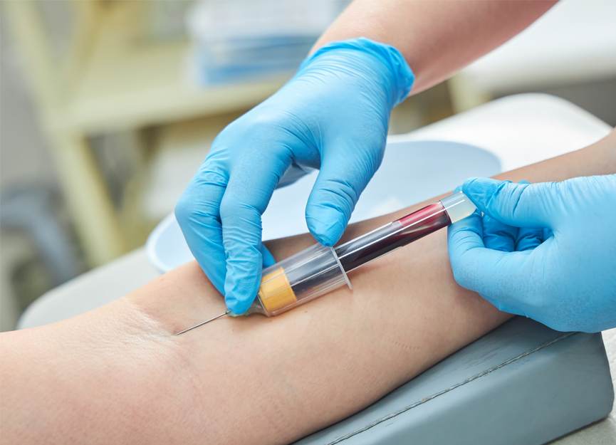 A health professional taking a blood sample