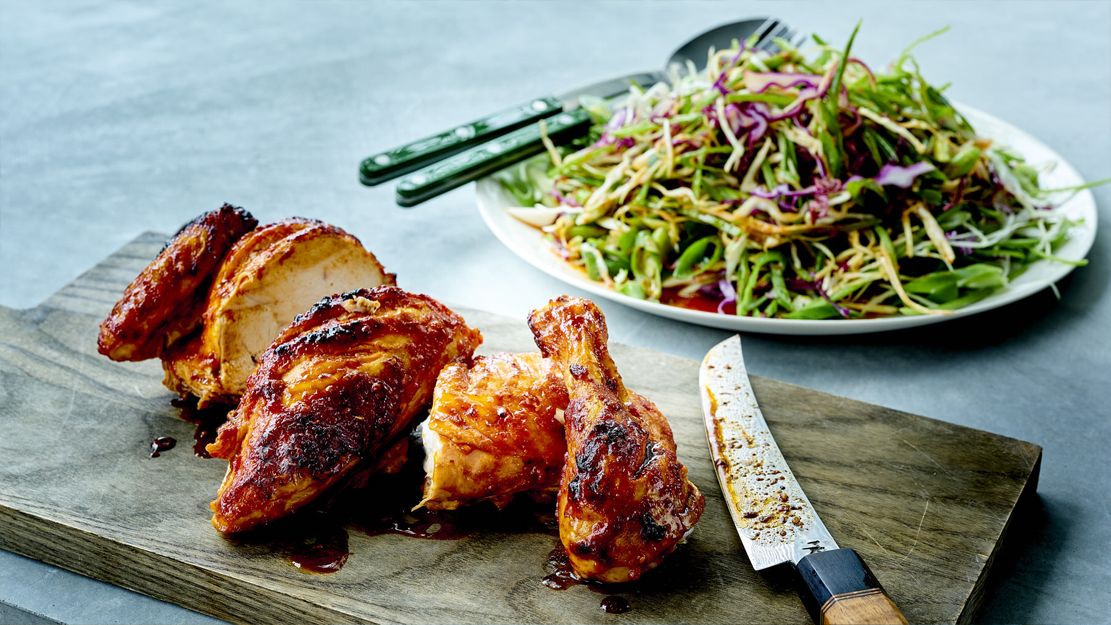 Korean BBQ chicken with white and red cabbage slaw