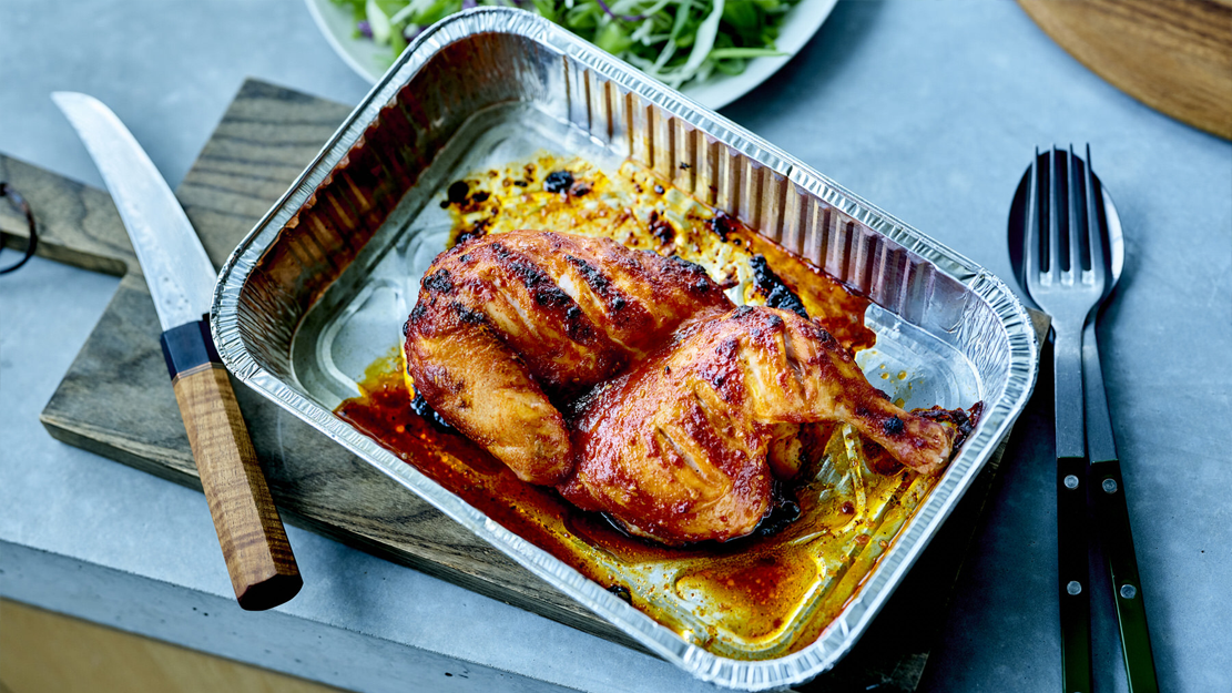 Korean BBQ chicken with white and red cabbage slaw