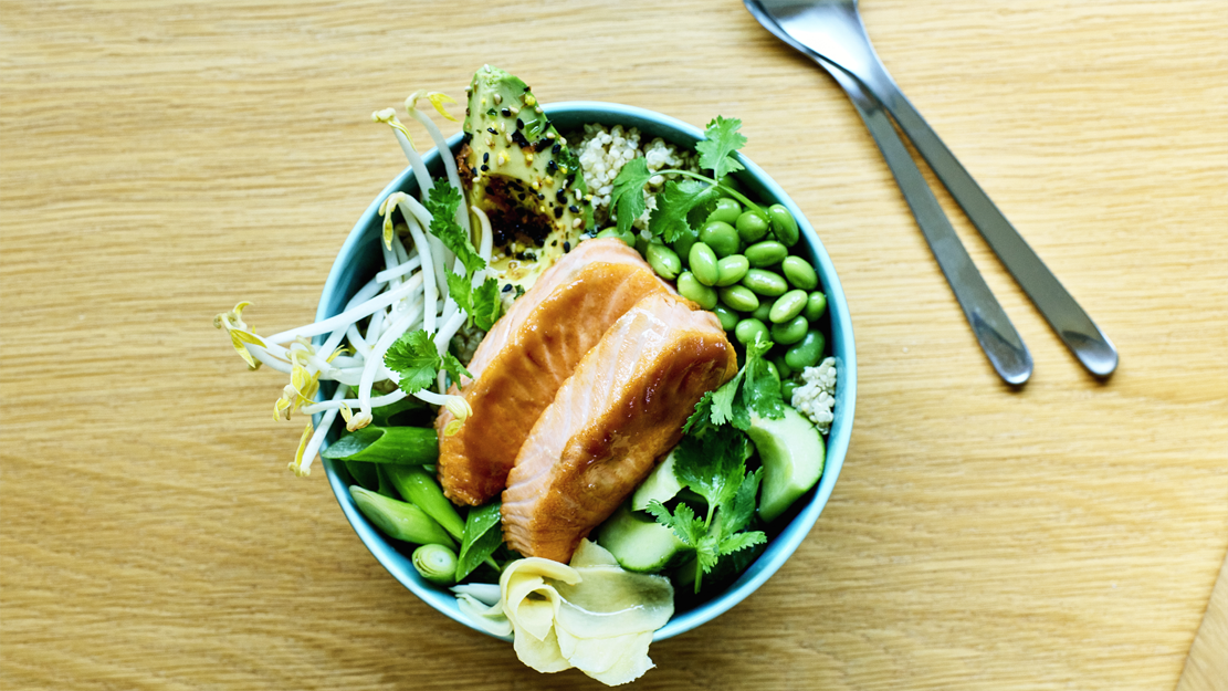 Miso glazed ocean trout poke bowl with quinoa and avocado