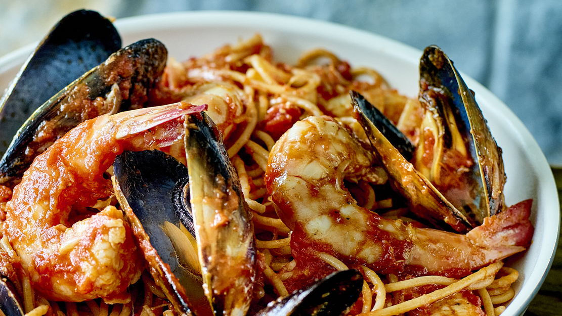 Seafood linguini with fennel and radicchio salad