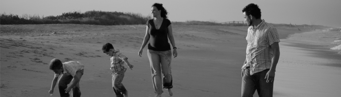 Family walking on beach
