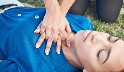 Female receives CPR from a bystander