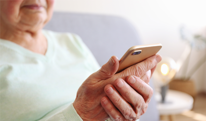 Elderly woman using a smartphone