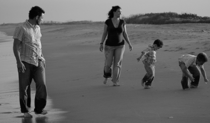 Family walking on a beach