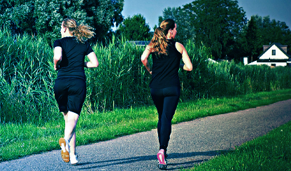 Two women running