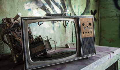 An old TV on a table